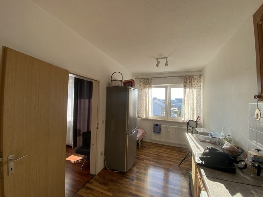 Helle 66 m² Dachgeschosswohnung in Heepen - Küche mit Essbereich